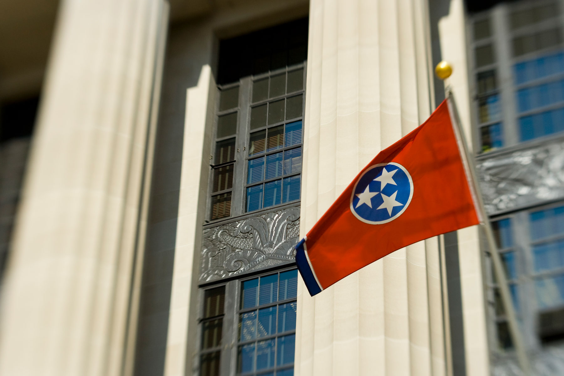 Tennessee state flag in front of government building