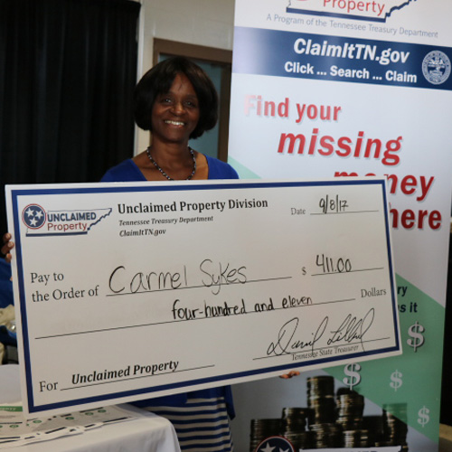 TN unclaimed property claimant with check