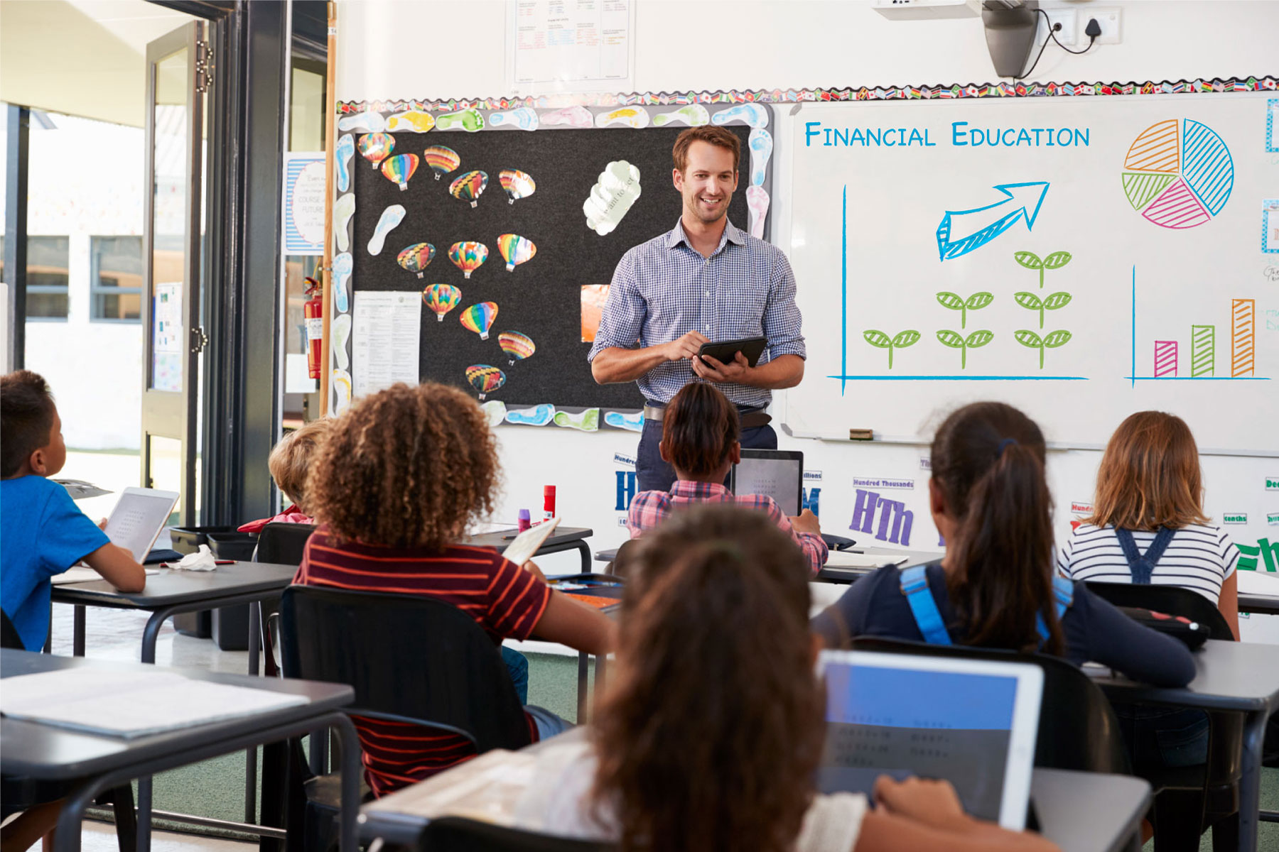 teacher in front of classroom